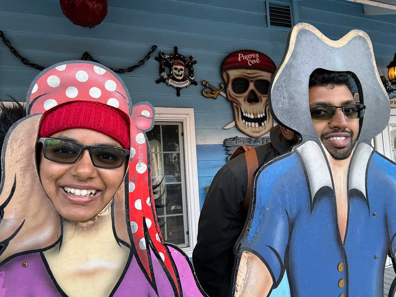 A fun and whimsical moment captured with pirate-themed cardboard cutouts, a playful addition to romantic things to do in Long Beach for couples who enjoy lighthearted activities.
