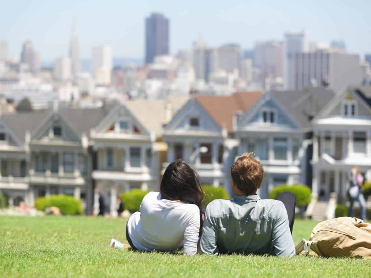 A doctor warmly interacting with an elderly patient in a healthcare setting, representing safety and healthcare quality in Denver vs San Francisco. The image focuses on the human aspect of care and wellbeing.