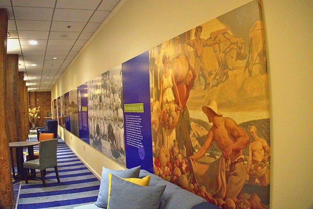 a wall of historical exhibits in the lounge at Argonaut Hotel