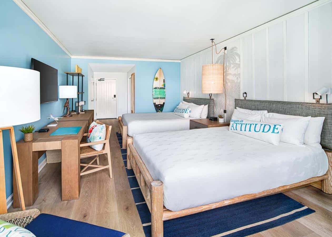 A beach-themed hotel room with a surfboard and ocean vibes, perfect for surfers finding where to stay in Gaslamp Quarter San Diego.