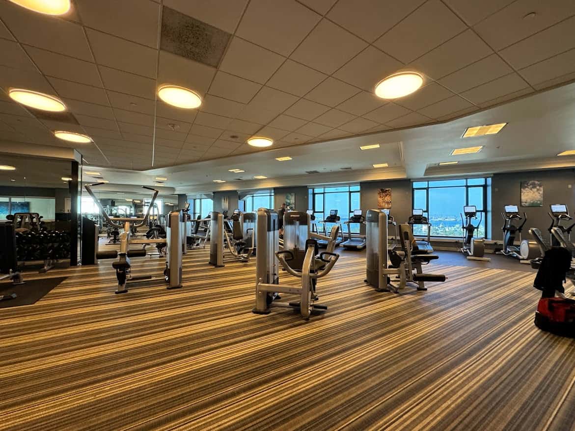 fitness center with machines on a carpet floor in Manchester Grand Hyatt, one of the best hotels to stay near Seaport Village San Diego