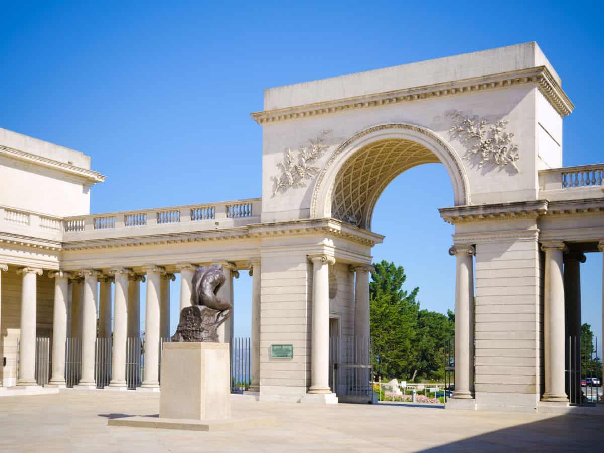 The Neoclassical facade of the Legion of Honor museum in San Francisco, featuring a large arch and columns, showcasing a serene and historic setting that offers a rich exploration of art and culture, a must-visit for things to do in San Francisco.