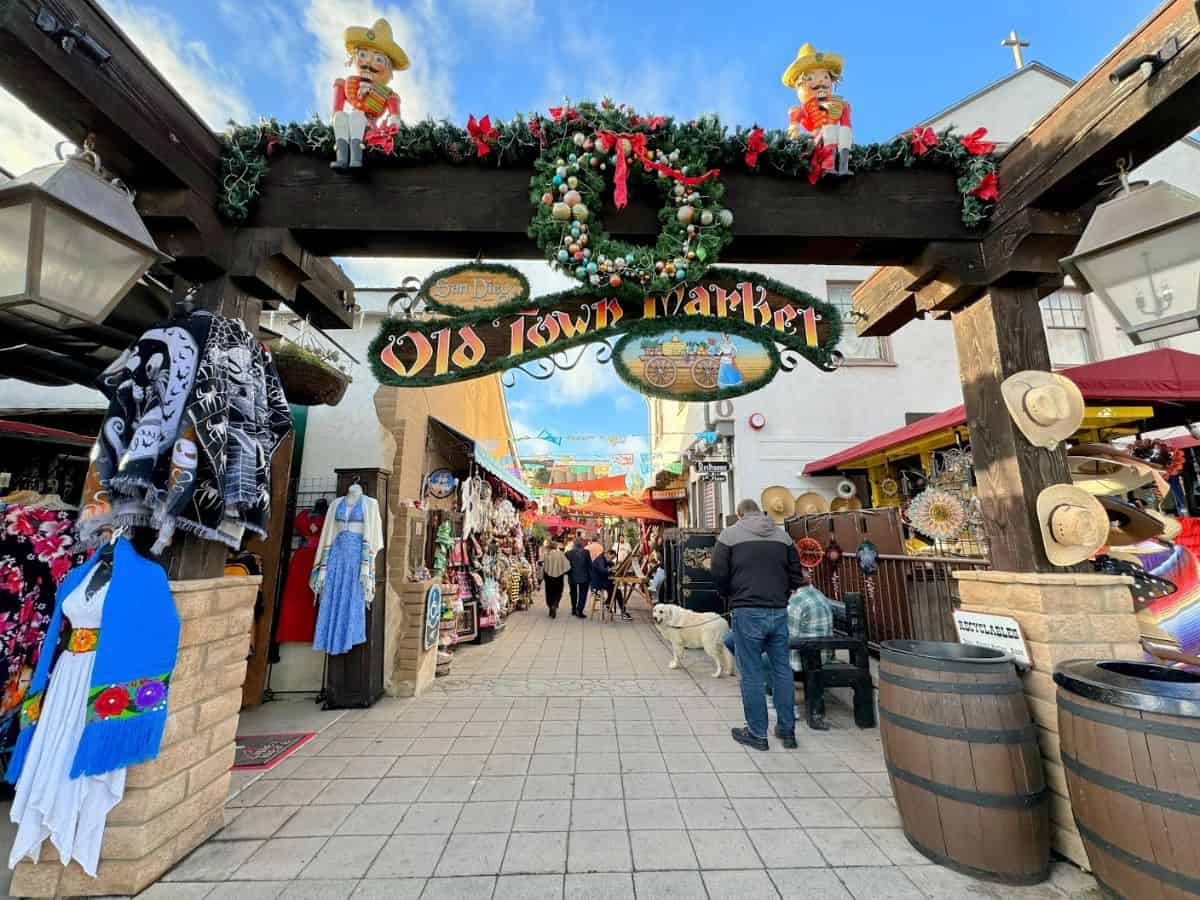 The entrance to the vibrant Old Town Market in San Diego, adorned with colorful decorations, showcasing local crafts and souvenirs, one of the top things to do in San Diego.