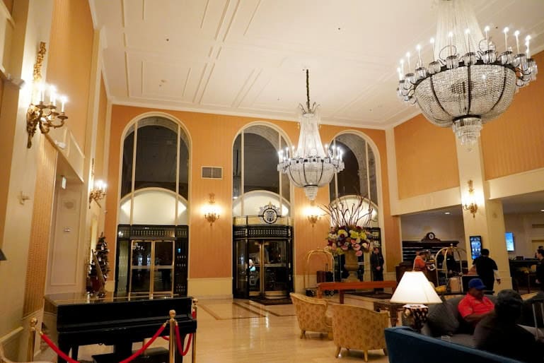 The opulent lobby of the InterContinental San Francisco, featuring soaring ceilings, crystal chandeliers, and a classic design that radiates sophistication.