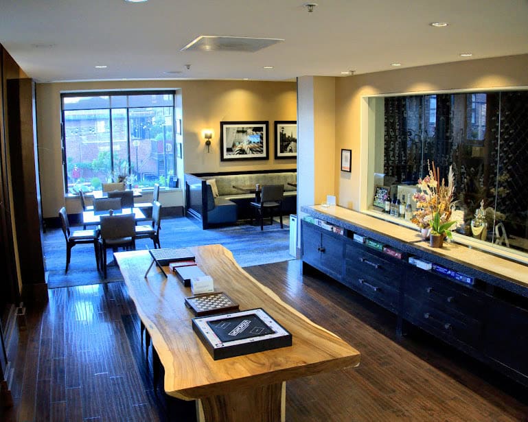 The glamorous lobby of the Fairmont San Francisco, showcasing grand chandeliers, opulent decor, and an air of timeless luxury.