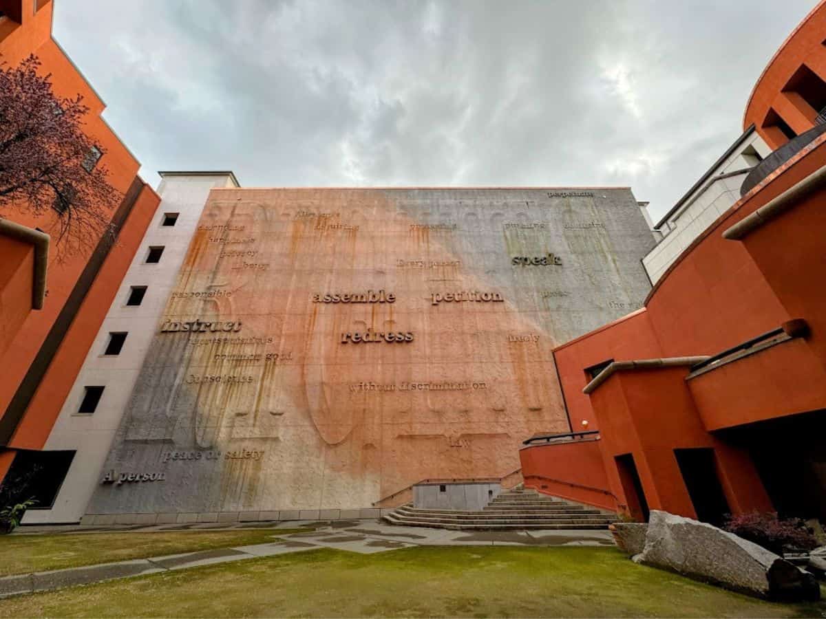 A large outdoor wall at the California State Library features etched words from the First Amendment, a meaningful landmark found in the 32 Things To Do In Sacramento.