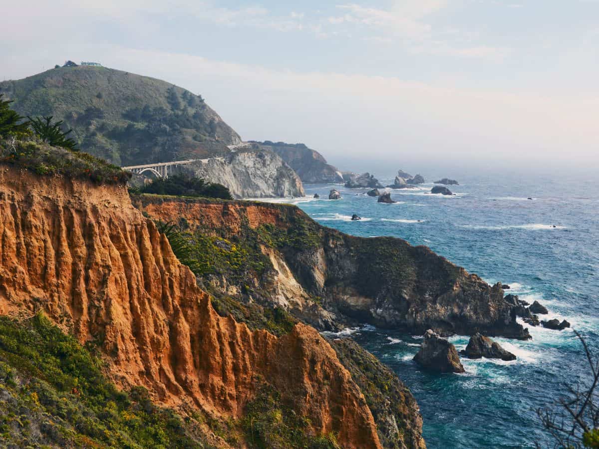 With steep cliffs plunging into the Pacific Ocean, Big Sur’s stunning coastline closely resembles Portugal’s Algarve region.