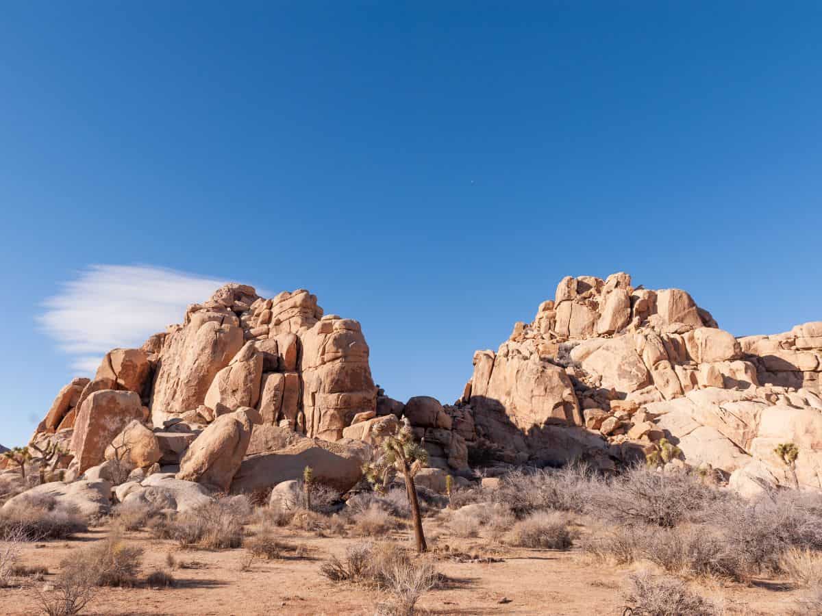 The striking rock formations and arid landscape of Joshua Tree National Park resemble the Tabernas Desert in Spain.