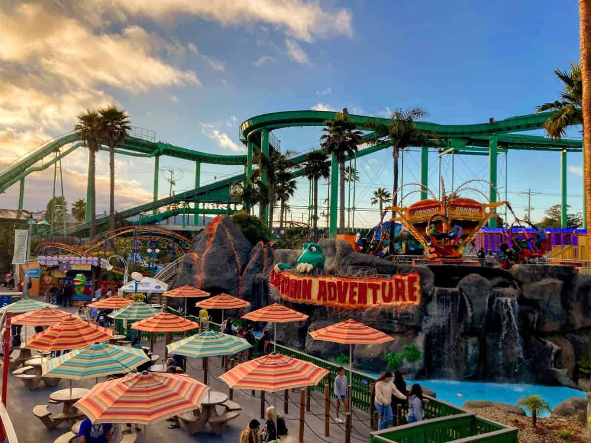 The Santa Cruz Beach Boardwalk is alive with color and energy, featuring the classic Giant Dipper roller coaster and lively attractions. Riding the coasters and enjoying treats like funnel cake is a must on the list of 21 Things to Do in Santa Cruz.