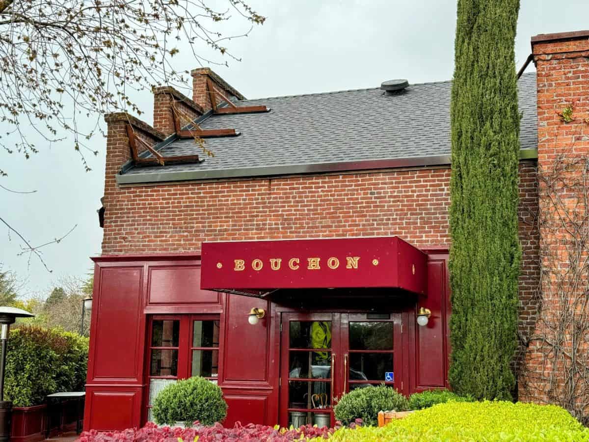 Bouchon Bistro’s brick facade and bold red awning invite diners into this beloved Yountville staple known for French classics. A refined yet welcoming pick on the 17 best places to eat in Napa Valley list.