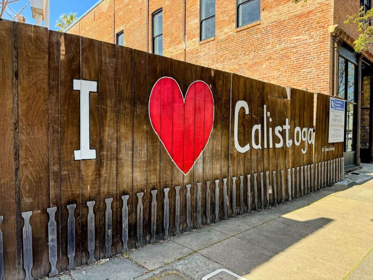 A wooden fence mural in downtown Calistoga reads “I ♥ Calistoga” in bold letters, making it a perfect photo op and a fun thing to do in Calistoga for visitors.