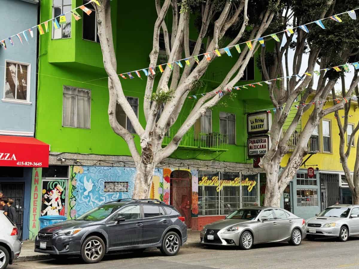 Colorful vibrant neighborhood in Bae Area and Beyond with lively street scene and unique local shops.