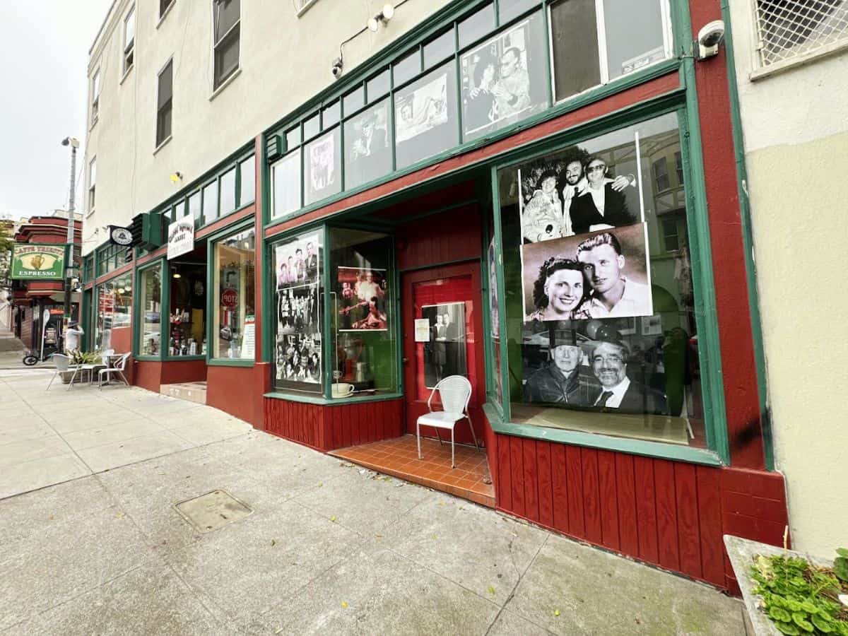 Charming cafe exterior with celebrity photos, perfect for enjoying coffee and community in Bae Area and Beyond.