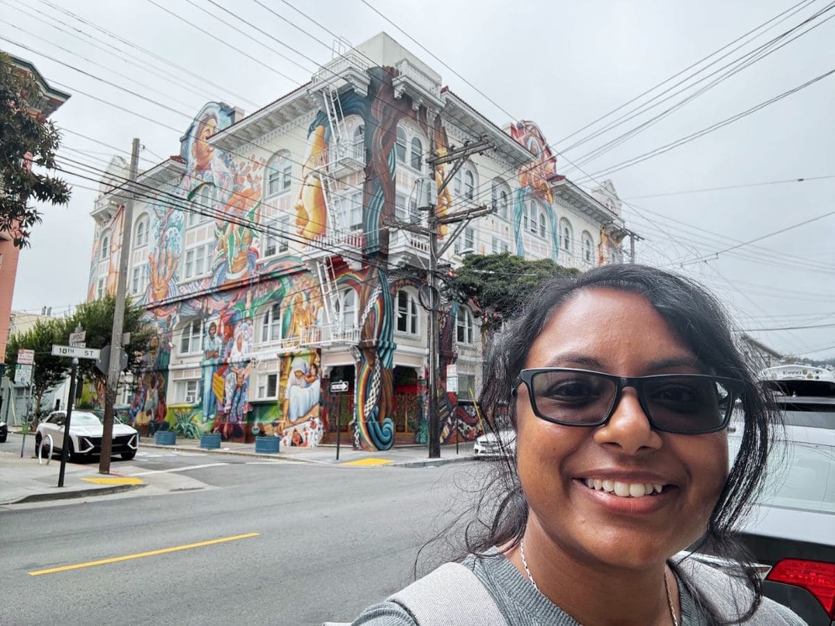 Colorful mural art on a historic building in the Bae Area and Beyond, capturing vibrant street art and urban culture.